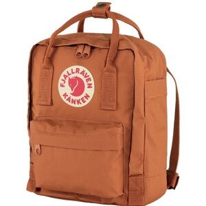 Brand new burnt-orange mini fjallraven backpack